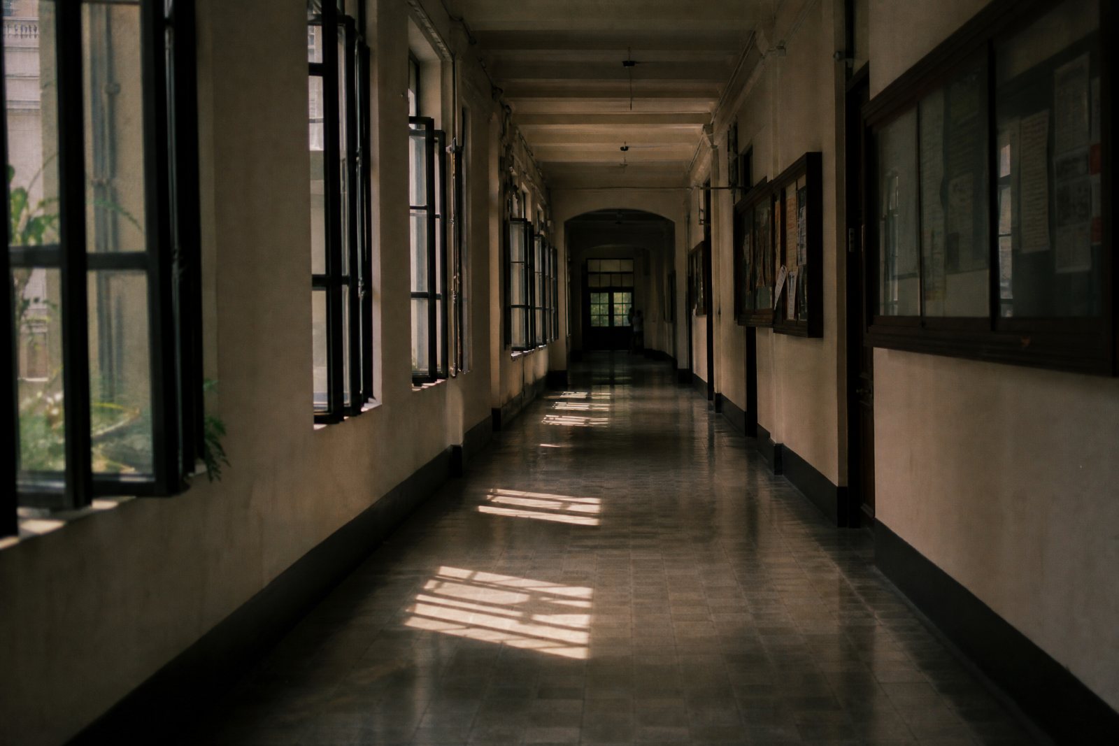 The university corridor where Andrea and Paolo first queued in the wrong line.