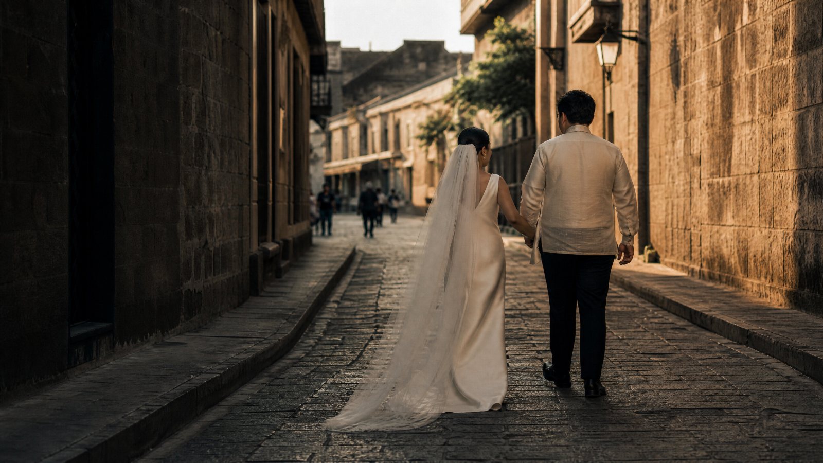 A cobbled Intramuros street on the walk between church and reception.